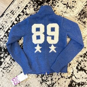 Soft knitted cardigan with '89' intarsia on the back and two front pockets
